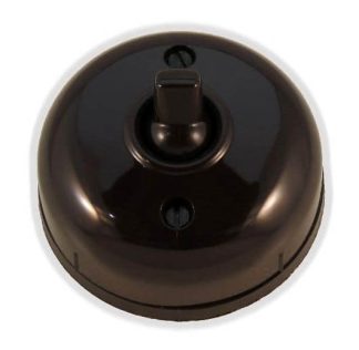 Bakelite Light Switch. Brown 52mm diameter.